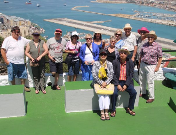 UK Another happy Rotary Group photo overlooking the unique airport from the Rock of Gibraltar